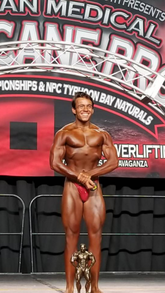 Quinn Wills, 12, posing at the Hurricane Bay Pro bodybuilding competition
