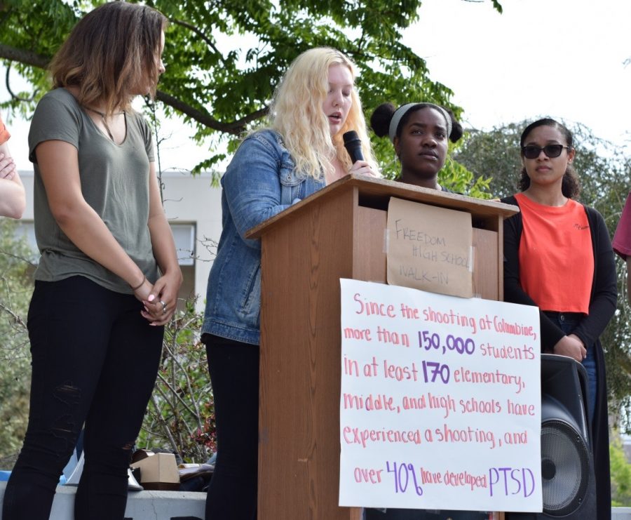 From left to right: Grace Duppins, 12, Alexis Leer, 12, Elois Hannah, 11, and Cathryn Boga, 11.  Alexis gives the first speech of the rally.  She told the stories of Florida students and children killed in gun violence incidents. 